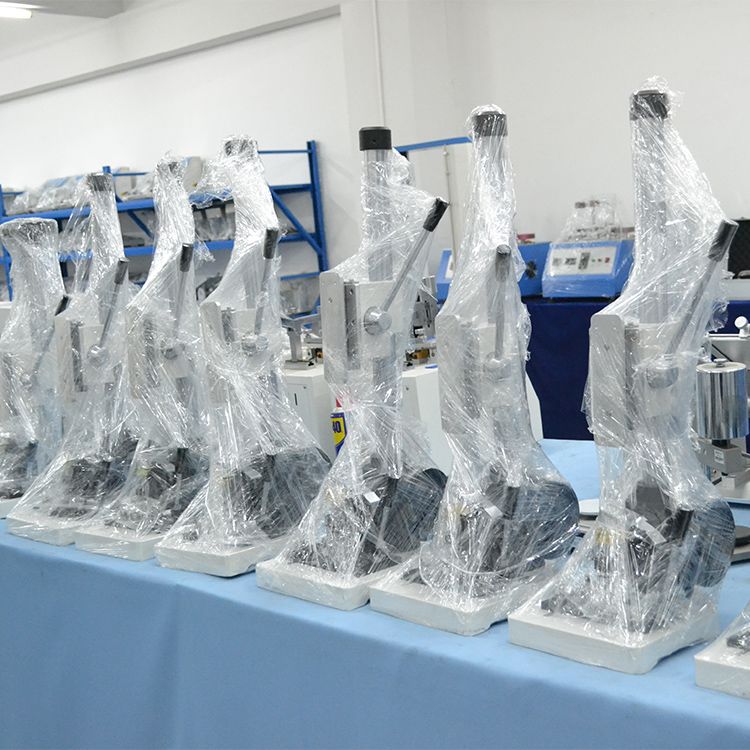 เครื่องทดสอบแรงดึงและแรงกดแบบมีมอเตอร์พร้อมมาตรวัดแรงดึง ASTM PS79-96 สำหรับกระดุมแป๊ก